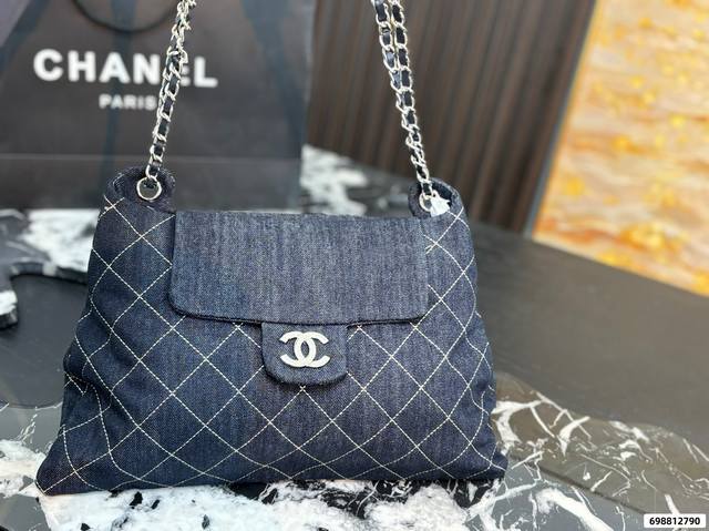 Chanel hobo bag, perfectly capturing the essence of this popular Chanel style. T