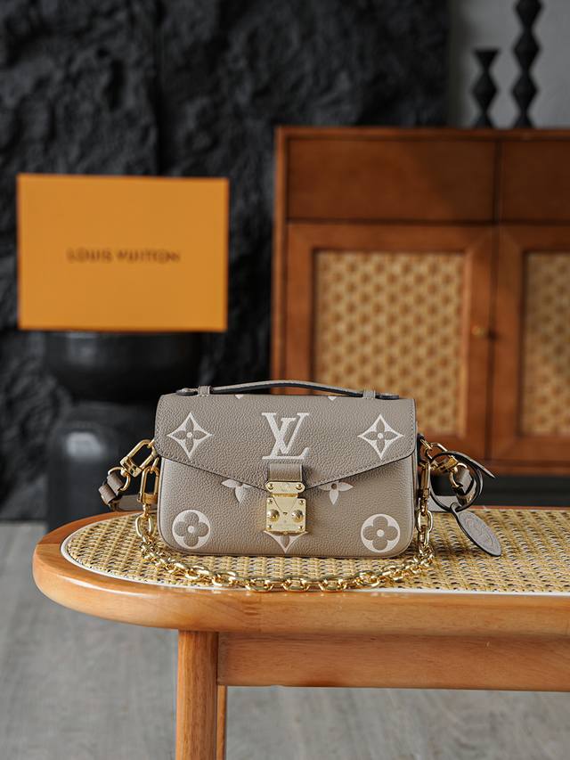 pochette Metis 郵差包 M23081 本款pochette MéTis East West手袋為Monogram Empreinte皮革壓印Mon pochette Metis 郵差包 M23081 本款pochette MéTis East West手袋為Monogram Empreinte皮革壓印Mon