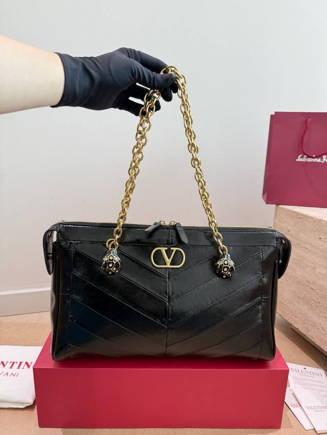 Valentino Panthea handbag with gift box. Celebrity style. The chain strap can be