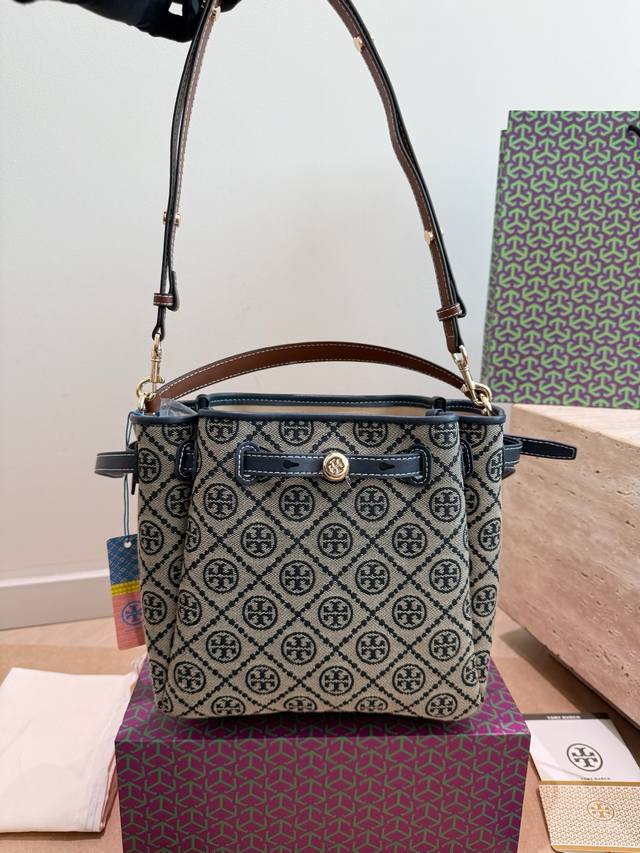Folding Box Tb Tory Burch Romy Monogram Bucket Bag The Tory Burch Romy series mo
