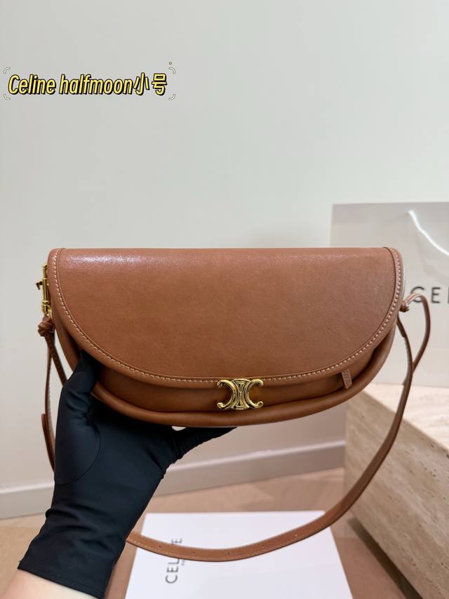 Gift Box Available. This Celine Little Halfmoon bag is made of black lambskin wi