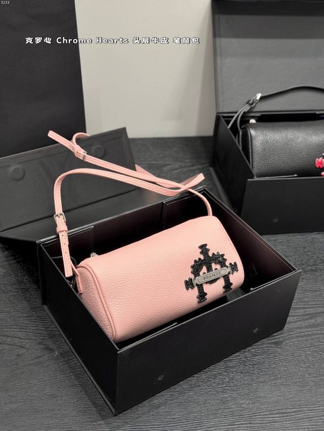 Chrome Hearts small cylindrical bag in black and red, made of top-grain cowhide.