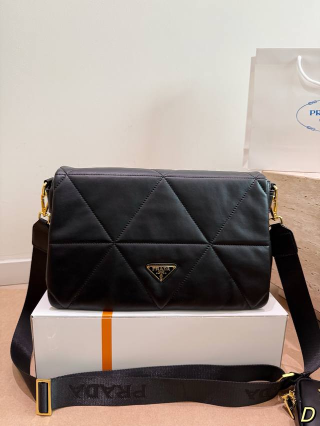 Prada Quilted Leather Crossbody Bag. This black Prada quilted leather crossbody Prada Quilted Leather Crossbody Bag. This black Prada quilted leather crossbody