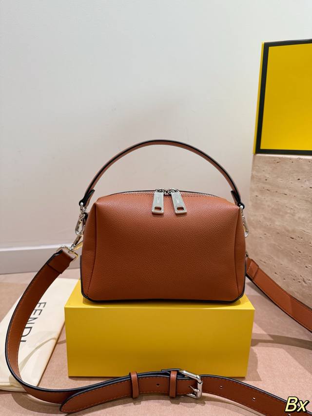 Fendi Peekaboo Mini Handbag The Fendi Peekaboo mini handbag, made of black grain Fendi Peekaboo Mini Handbag The Fendi Peekaboo mini handbag, made of black grain