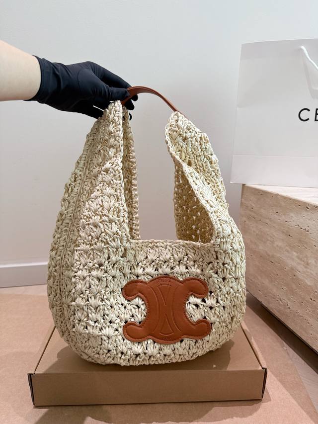 Comes with airplane box. This Celine raffia bag is a classic piece from the bran