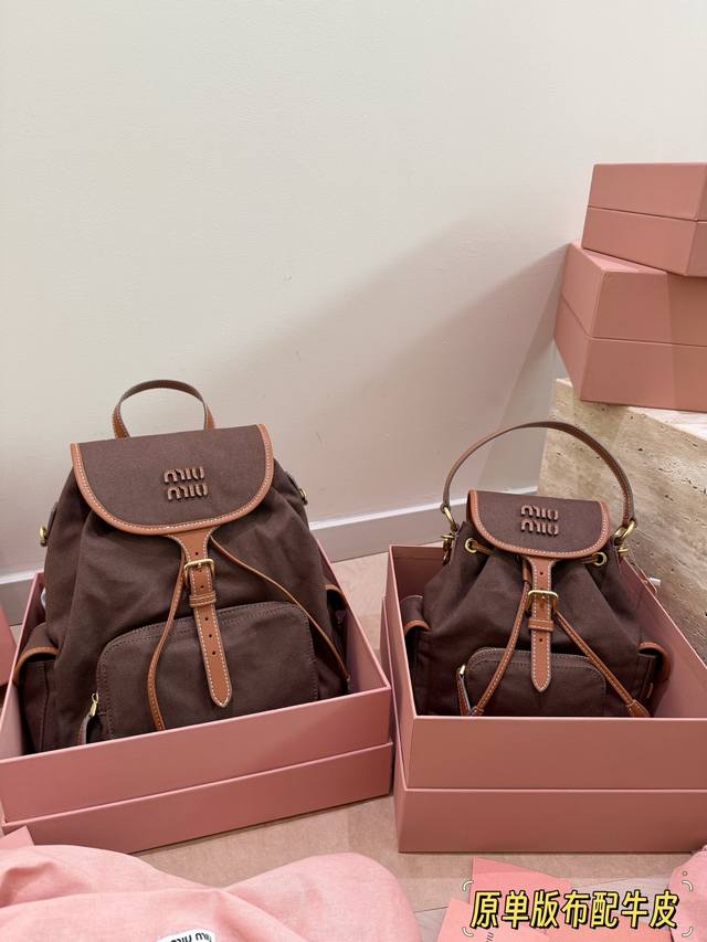 Original Miumiu Brown Canvas and Leather Backpack This Miumiu brown canvas and l