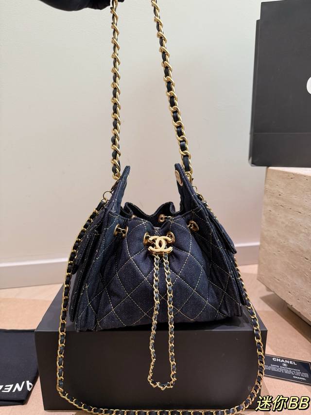 Denim Chanel 25C Hobo Shoulder Bag. This Chanel 25C Hobo shoulder bag features a