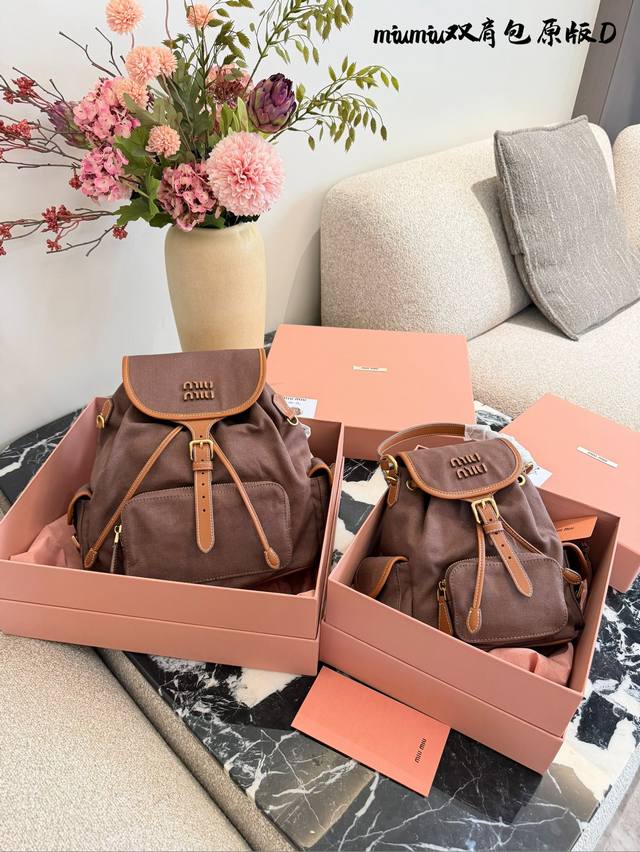 Original Miumiu Brown Canvas and Leather Backpack. This brown canvas and leather