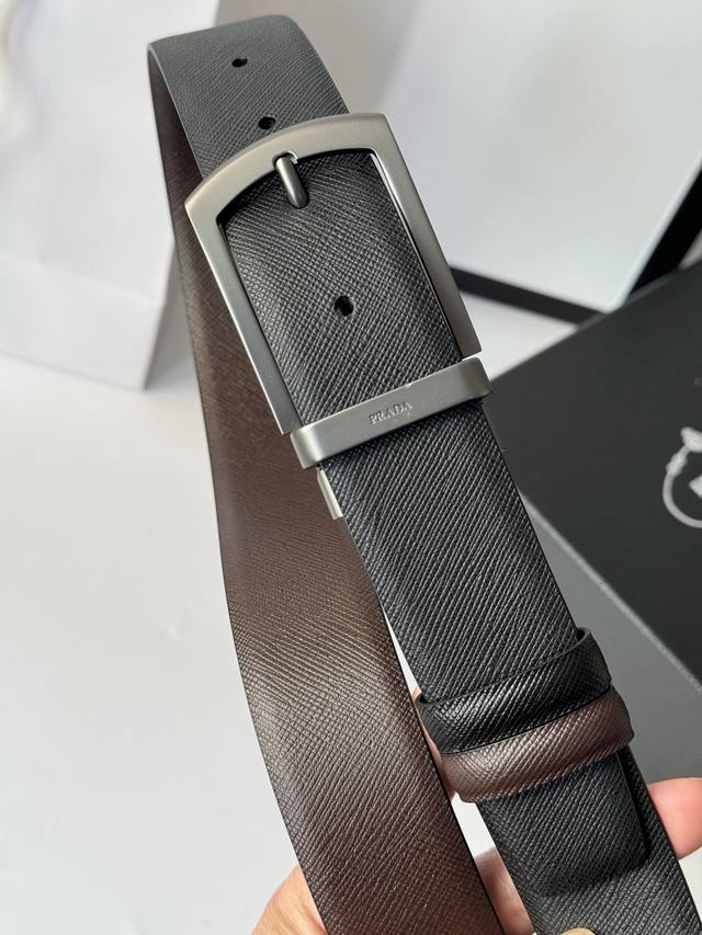 190 -- Prada men's rotating pin buckle, double-sided cross-grain design, a styli 190 -- Prada men's rotating pin buckle, double-sided cross-grain design, a styli