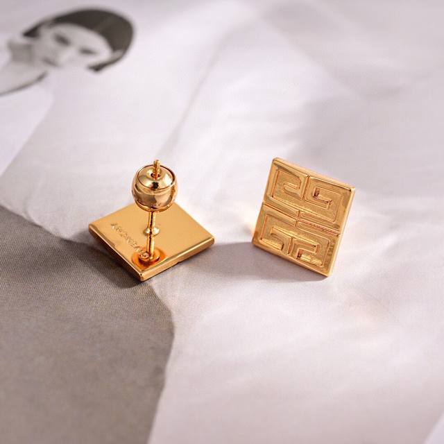 Givenchy earrings. I especially love the Infinity symbol, which adds a touch of
