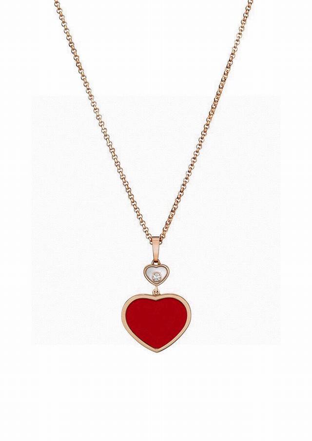 Chopard necklace with red agate, heart-shaped pendant, and sparkling diamonds. S