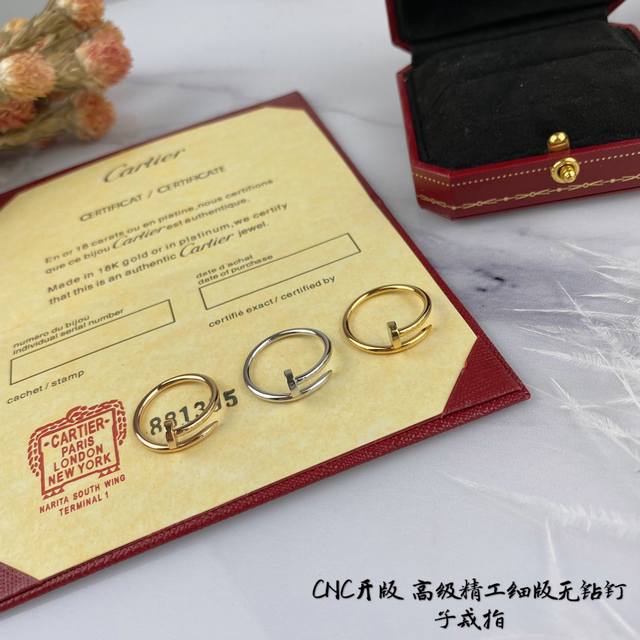 A mini Cartier nail ring, size 678, crafted with exquisite detailing. Available A mini Cartier nail ring, size 678, crafted with exquisite detailing. Available
