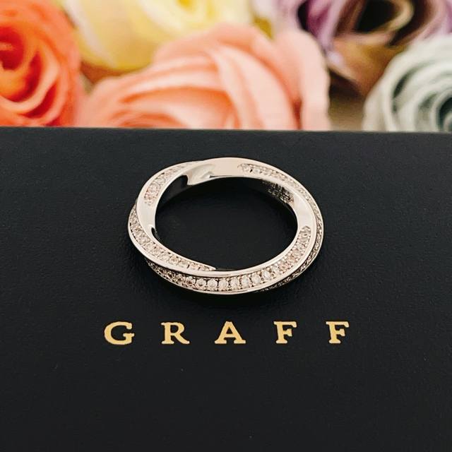 Size: 6, 7, 8. Graff's latest silver diamond-encrusted rhombus M?bius ring, made