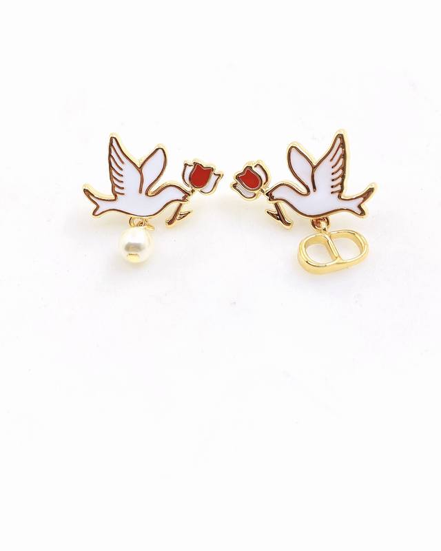 Daor's latest dove and rose earrings, identical to batch Z, made of brass.