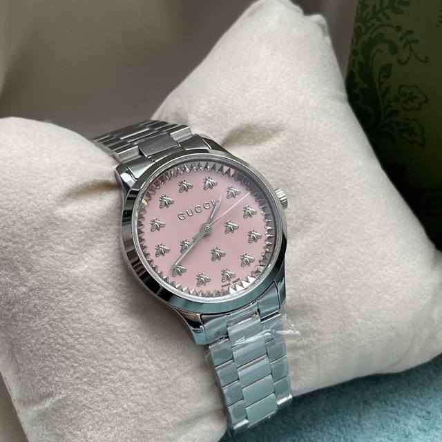 This Gucci pink dial watch is perfect for girls, looking exquisite and beautiful
