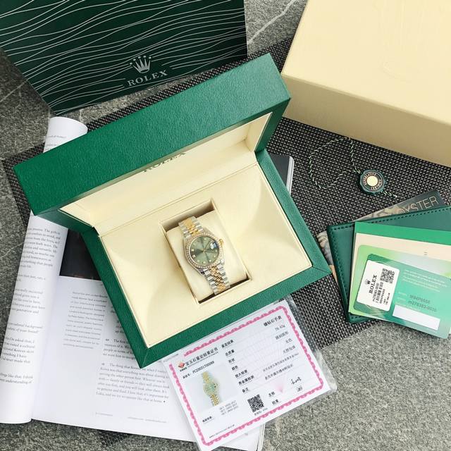Rolex Ladies' Oyster Datejust! Featuring the hottest green dial of the year, wit