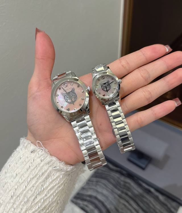 White 280 Gold 390 Gucci matching watches. Men's 38mm, Women's 29mm. Cat face, s