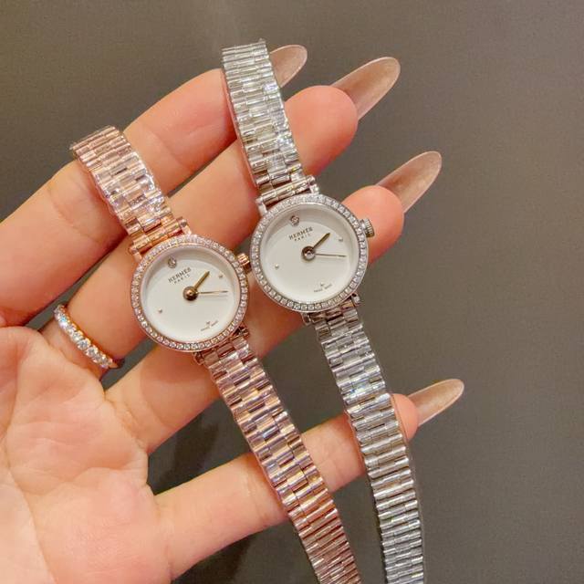 id2995623Fff, white 330, gold 460) features a smaller, more delicate dial (appro