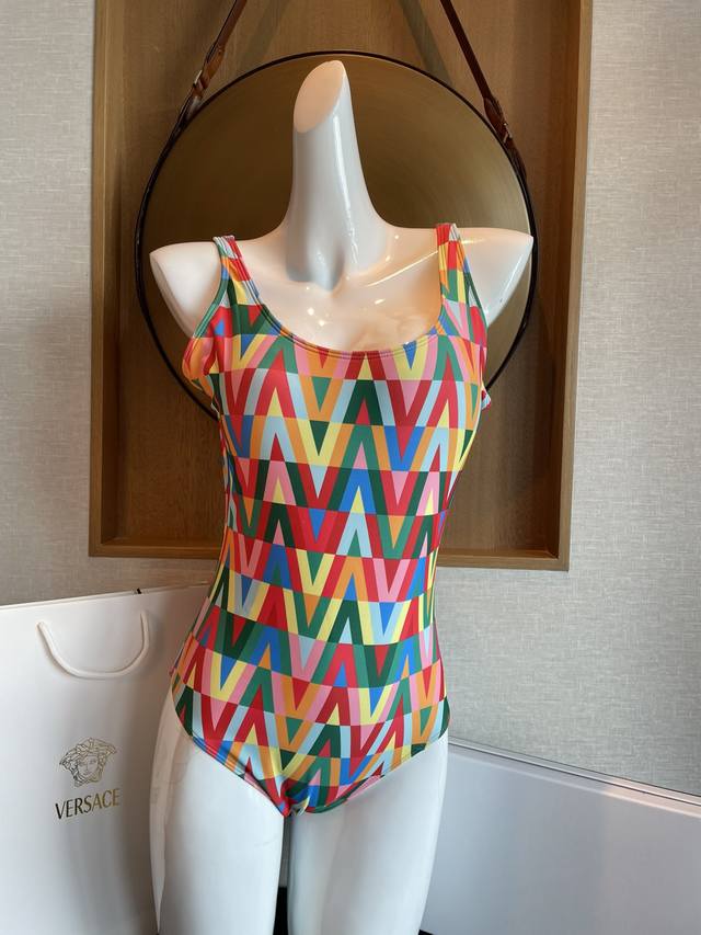 Valentino swimsuit, 140. New Valentino color option, available in all major depa