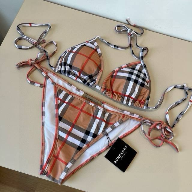 Burberry swimsuit, 100 RMB. This classic Burberry check swimsuit is absolutely g
