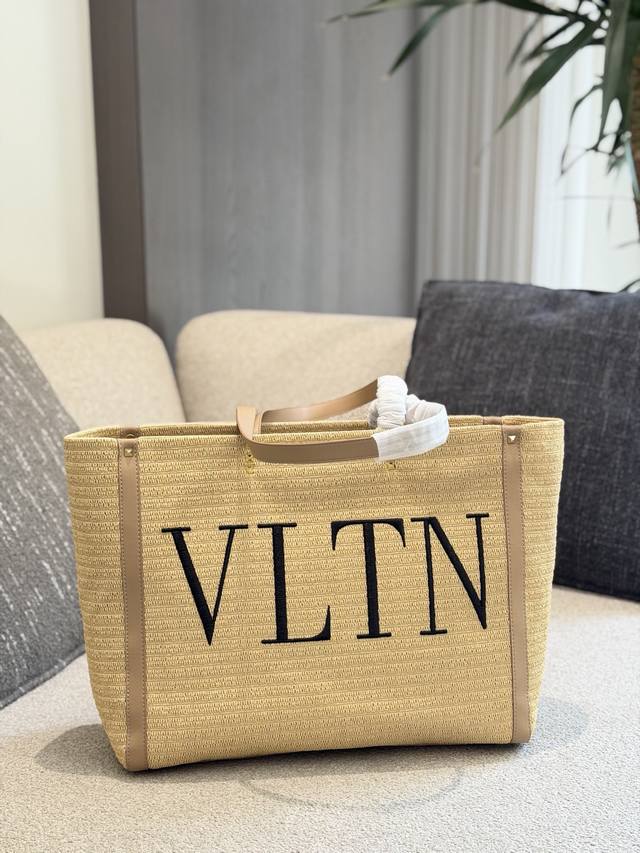 P330 Valentino Vltn Straw Tote Bag This Valentino Vltn straw tote bag is made of