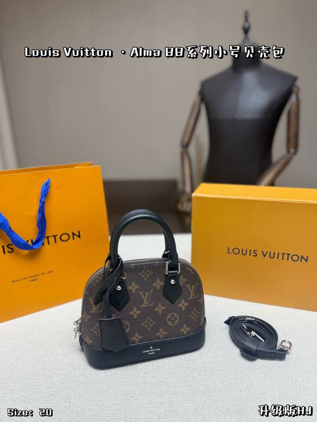 Small P260, comes with a folding box. The Louis Vuitton Alma BB shell bag featur