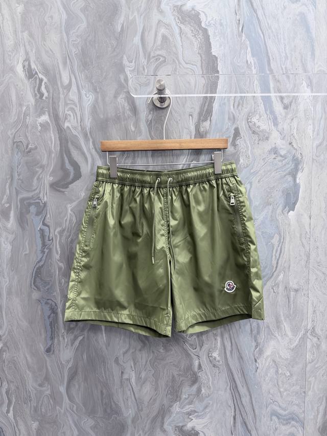 230M0Ncler 26 New swim trunks made from classic fabric, designed for a vibrant a