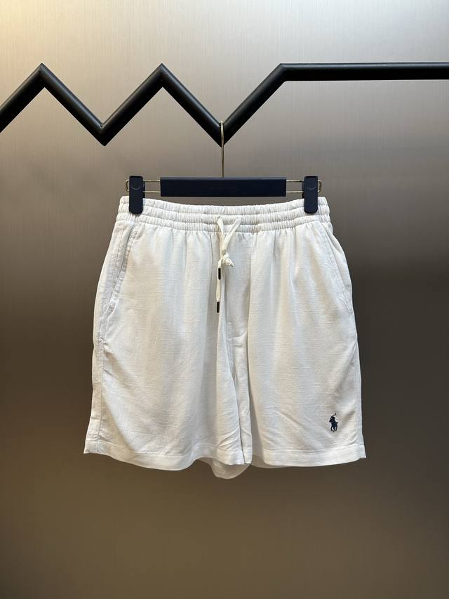 P160 Rl Embroidered Linen Shorts . Made with custom-designed luxurious linen, th