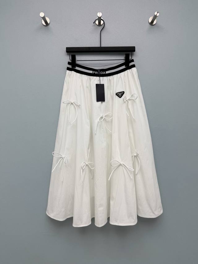 Prad*26 New Bow A-line Midi Skirt. The waistband features elasticated webbing wi