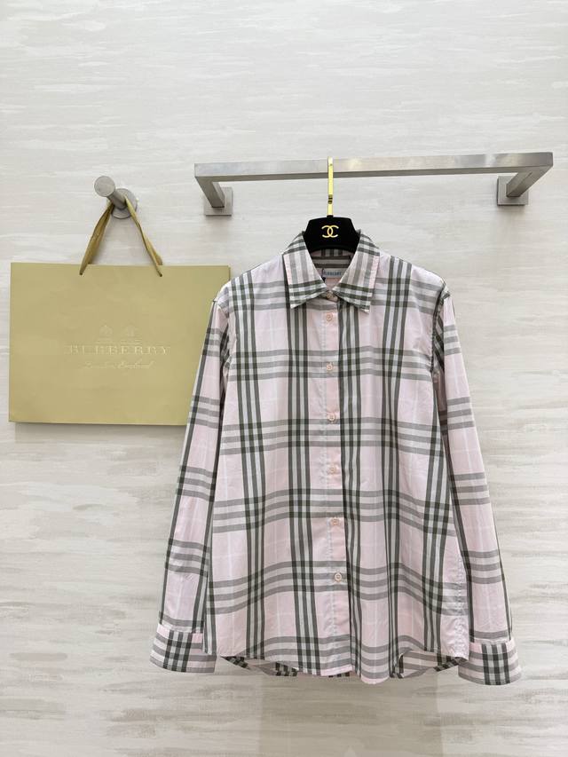 P340 A timeless classic | Burberry plaid shirt. A must-have plaid piece in any w