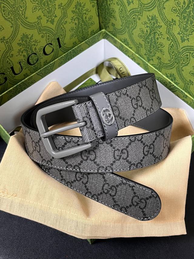 3.5 width grey calfskin, with a ring-stitched label. This grey belt features a s