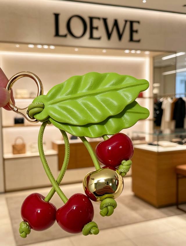 P80 - This Loewe cherry charm perfectly captures the sweetness of summer. Crafte
