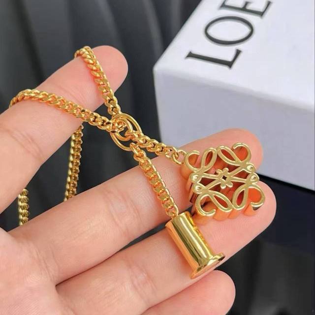 P80 The new Loewe logo necklace is truly amazing, incredibly artistic! Its logo