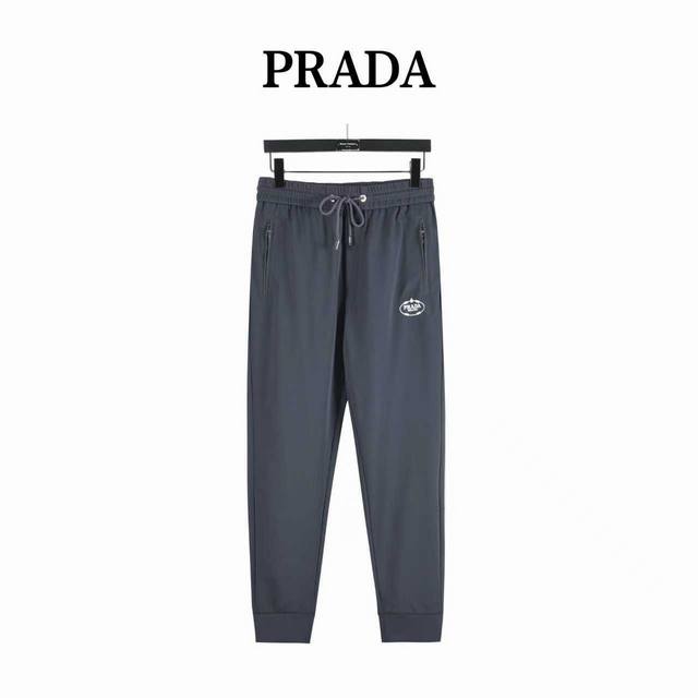 260 prada 普拉达 圆圈刺绣后口袋三角牌长裤 2025最新款休闲经典时尚长裤，尼龙材质，手感细腻，舒适透气！全新设计灵感，极具时尚代表性！略微弹性的功能