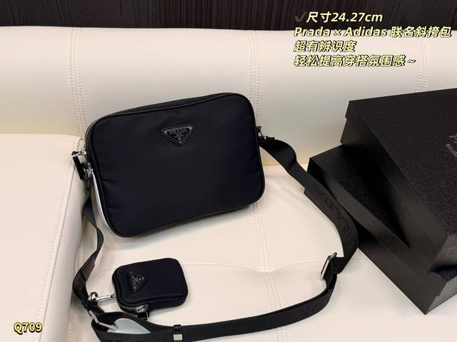 310 Comes with box . Size: 24.27cm. This Prada x Adidas collaboration crossbody