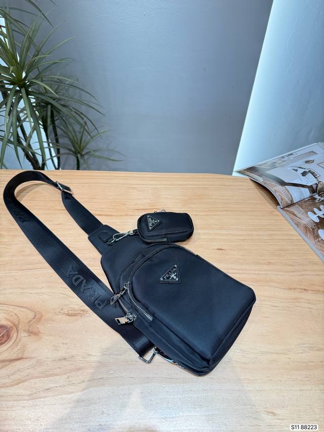 310 Prada Black Nylon Crossbody Bag This Prada black nylon crossbody bag is ligh