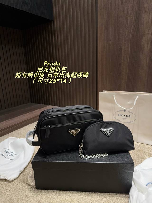 p240 Box included Dimensions: 25*14 cm. This Prada recycled nylon camera bag is