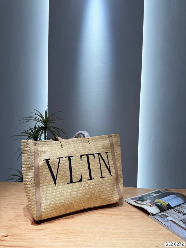 p330 Valentino Vltn Tote Bag This Valentino Vltn series tote bag features a crea