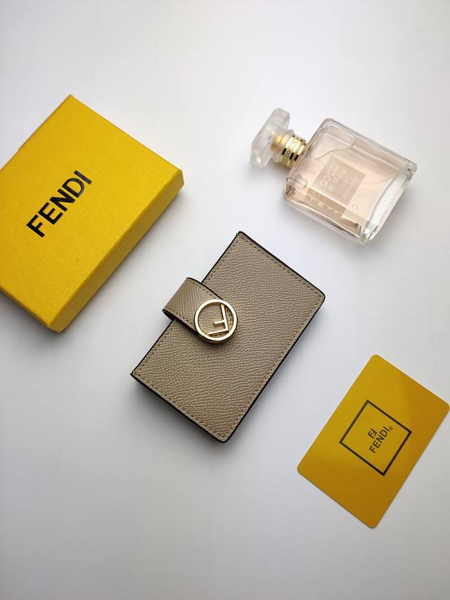 p110 Fendi Flat Card Holder with a central compartment and five card slots, feat