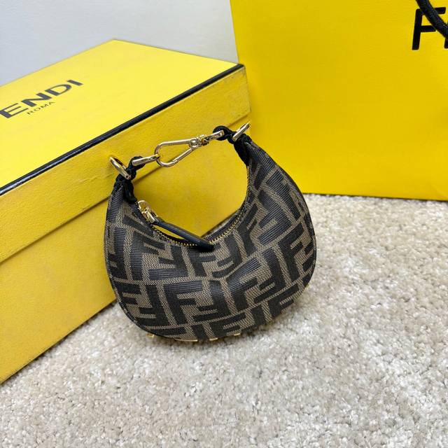 640 Fendigraphy Nano Crescent Bag, zip closure, adorned with vintage Fendi gold-