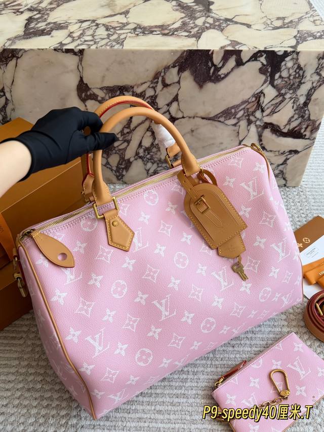 p390, 40cm LV Speedy P20 handbag. This LV Speedy P20 handbag, from the Pharrell