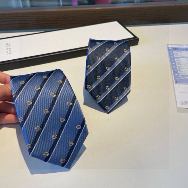 80 A new men's tie from the G brand boutique. Rarely seen, this tie features the