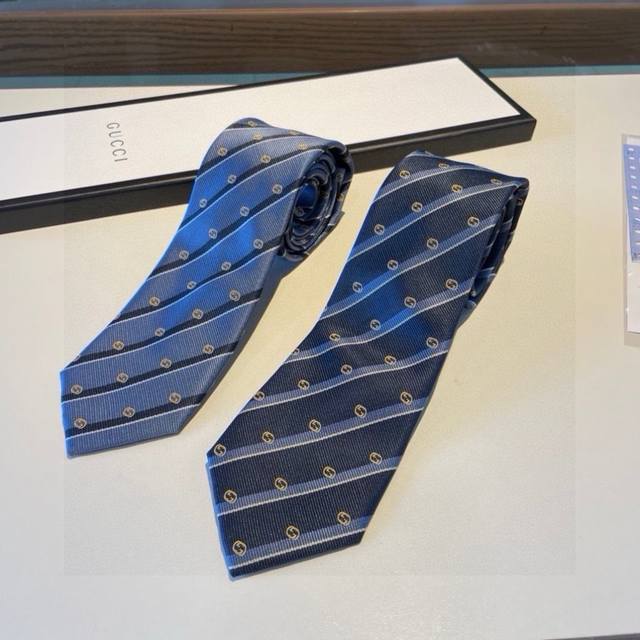 80 A new men's tie from the G brand boutique. Rarely seen, this tie features the