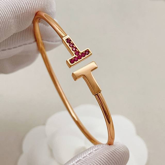 p80Tz030 Tiffany's latest rose gold polished diamond-encrusted double-T bracelet