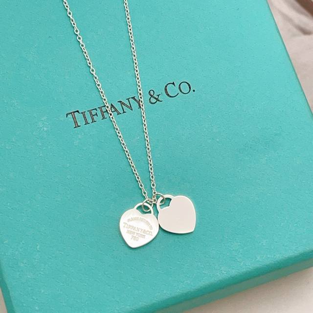 p70Tx101 Tiffany's latest silver polished double heart necklace, made of the sam