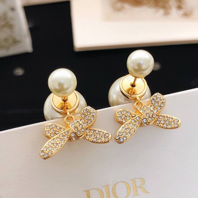 p70, serial number Ded0746, Dio* latest style bow earrings, identical to Zp bras