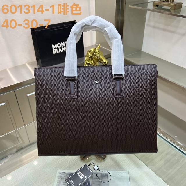 550. Montblanc 601314-1 brown briefcase is made of imported cowhide leather, whi