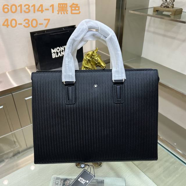 550. Montblanc 601314-1 black briefcase is made of imported cowhide leather, whi
