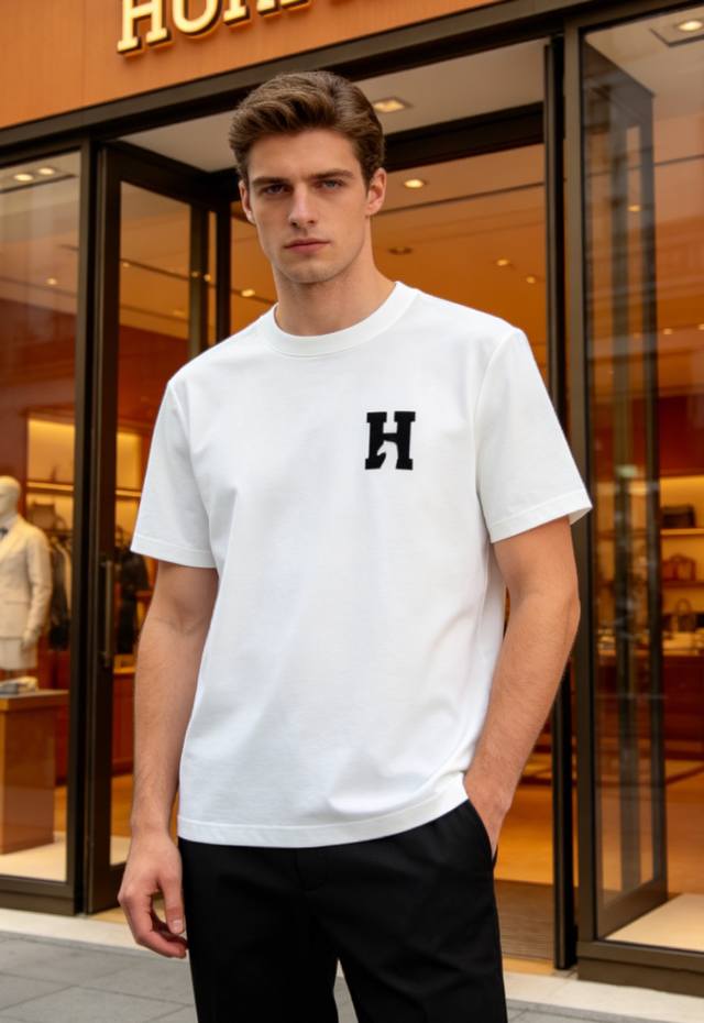 230 Herme* 26S New Mercerized Cotton T-Shirt. Classic Herme silhouette showcases