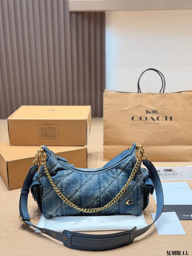 Replica p270 Coach Pocket Juliet 30 Handbag. This Coach Pocket Juliet 30 handbag